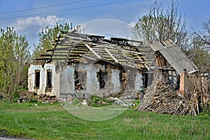 Old burned-out house in the village