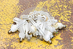 Old burnt used fluorescent incandescent bulbs