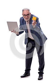 Old businessman with computer isolated on white