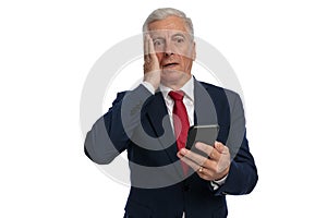 Old businessman feeling anxious to open he`s email