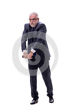 Old businessman holding penlight isolated on white