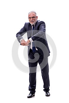Old businessman holding penlight isolated on white