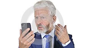 Old Businessman Upset by Loss on Smartphone, White Background