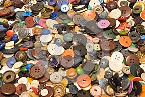 The old buttons. Buttons in an old metal box.