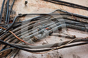Old cables on the street, the danger of poor wiring