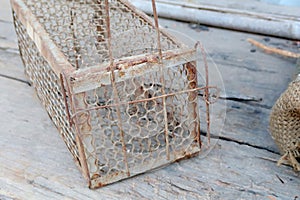 The old cage mousetrap with rusty