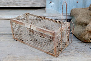 The old cage mousetrap with rusty