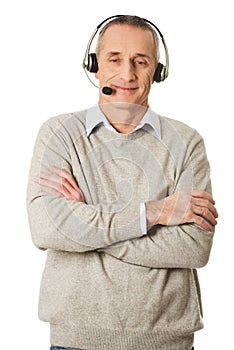 Old call center man wearing headset