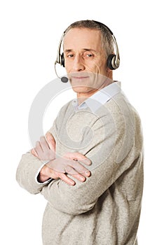 Old call center man wearing headset