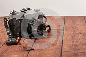 Old camera with lens close-up