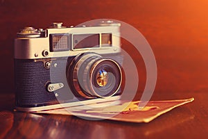 Old camera is on the table, instagram toning