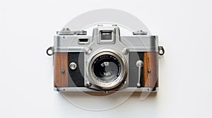 Vintage Silver And Wood Camera With Retro Design On White Background photo