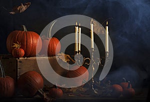 Old Candelabra with Pumpkins and Spooky Mist