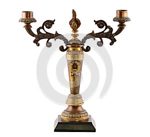 Old bronze candlestick isolated on white background