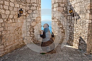 Old cannon in ancient fortress. Hvar