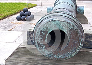 Old cannon and cannonballs