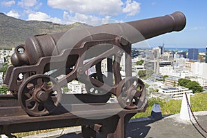 Old cannon at the entrance to the Fort Adelaide overlooking the city in Port Louis, Mauritius.