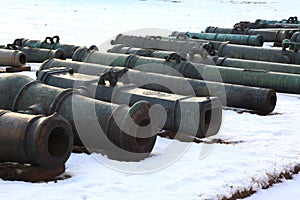 Old cannons on snow