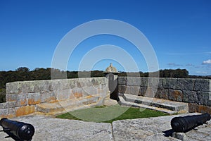 Old cannons and tower of Fortress santa tereza, uruguay photo