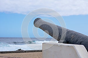 Old canon replica overseaing the sea at Saint pierre harbor RÃ©union island