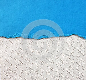 Old canvas texture background with delicate stripes pattern and blue vintage torn paper