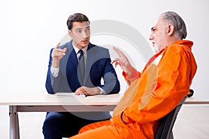 Old captive meeting with advocate in pre-trial detention