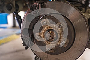 Old car brake disc to be replaced