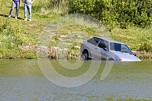 Old car felt into the water