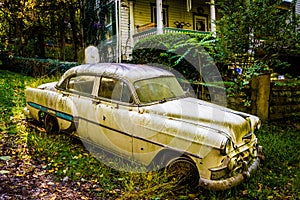 Old car in front of a house in Harpers Ferry, West Virginia.