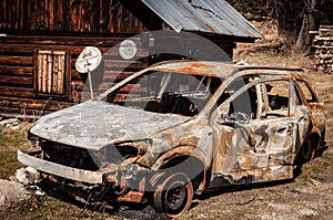 old car in front of old rural Slovak house