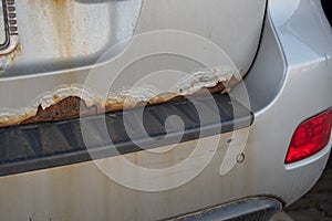 Old car with old rusty paint peeling off