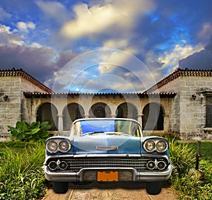 Old car parked in tropical house, cuba