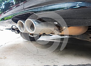 Old Car pipe. Exhaust.Double exhaust pipes of a car