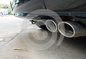 Old Car pipe. Exhaust.Double exhaust pipes of a car