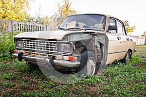 Old car. Rusty car. Dismantled abandoned car