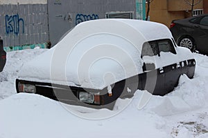 Old car under snow 05