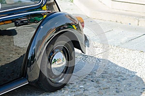 Old car wheel in a show