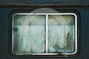 Old car window with rust