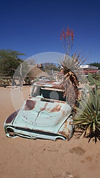 Old car wreck at Gas station Solitaire