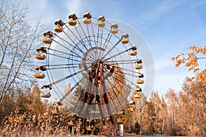 Old carousel wheel in an abandoned amusement park in Chernobyl