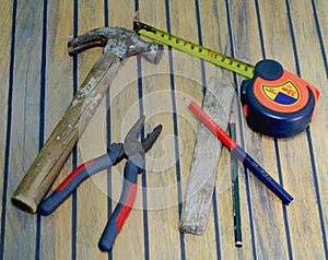 Old carpenter tools on the wooden table