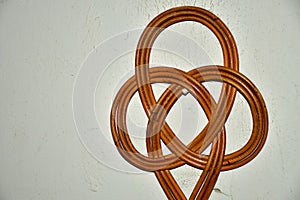 old carpet beater on a cellar wall in a German house