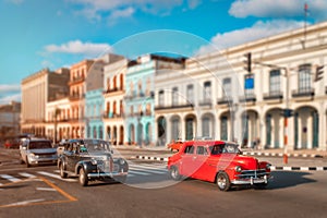 Old cars and colorful buildings in Havana