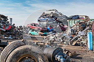 Old cars in landfill. Garbage pile in trash dump or landfill. Pollution concept.