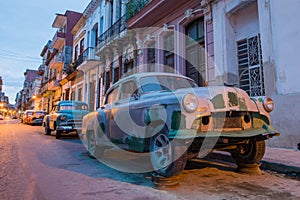 Old cars at old street of Havana