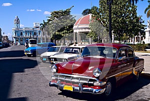 Old cars and rotunda, Cuba
