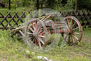Old cart on the lawn close-up