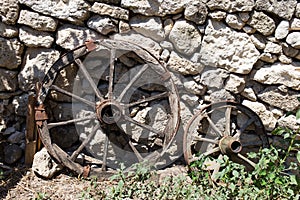 Old cart wooden wheels.