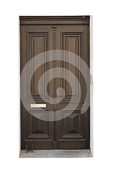 Old carved brown wooden door isolated on white background, surface. House or building exterior detail and decoration. Old and retr