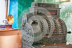 Old cash register and gramophone